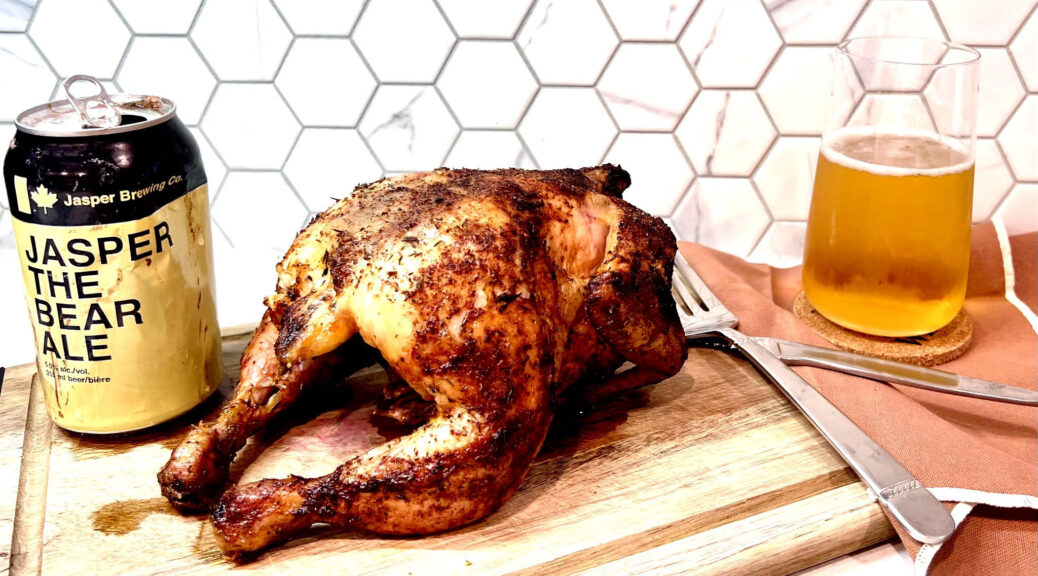 Beer can chicken cooked and ready to be carved